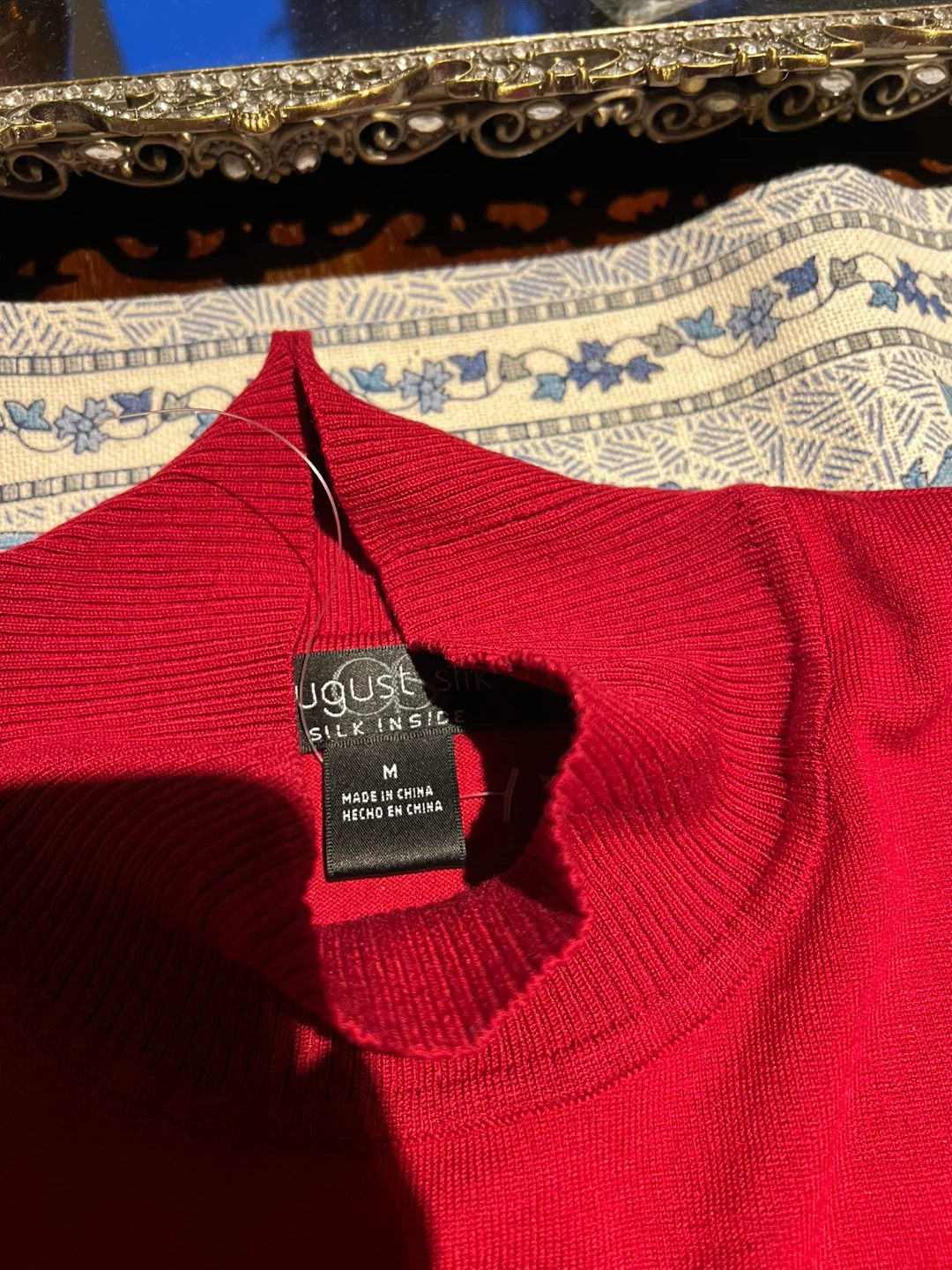 August Silk sleeveless mock neck top