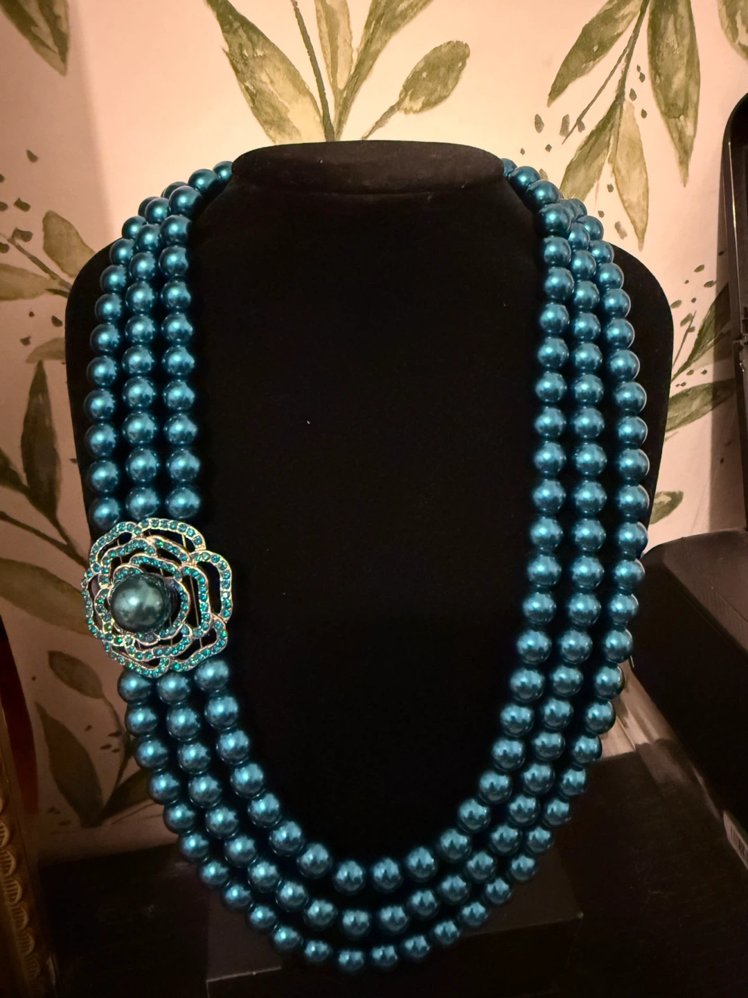 Turquoise beaded necklace with floral clasp