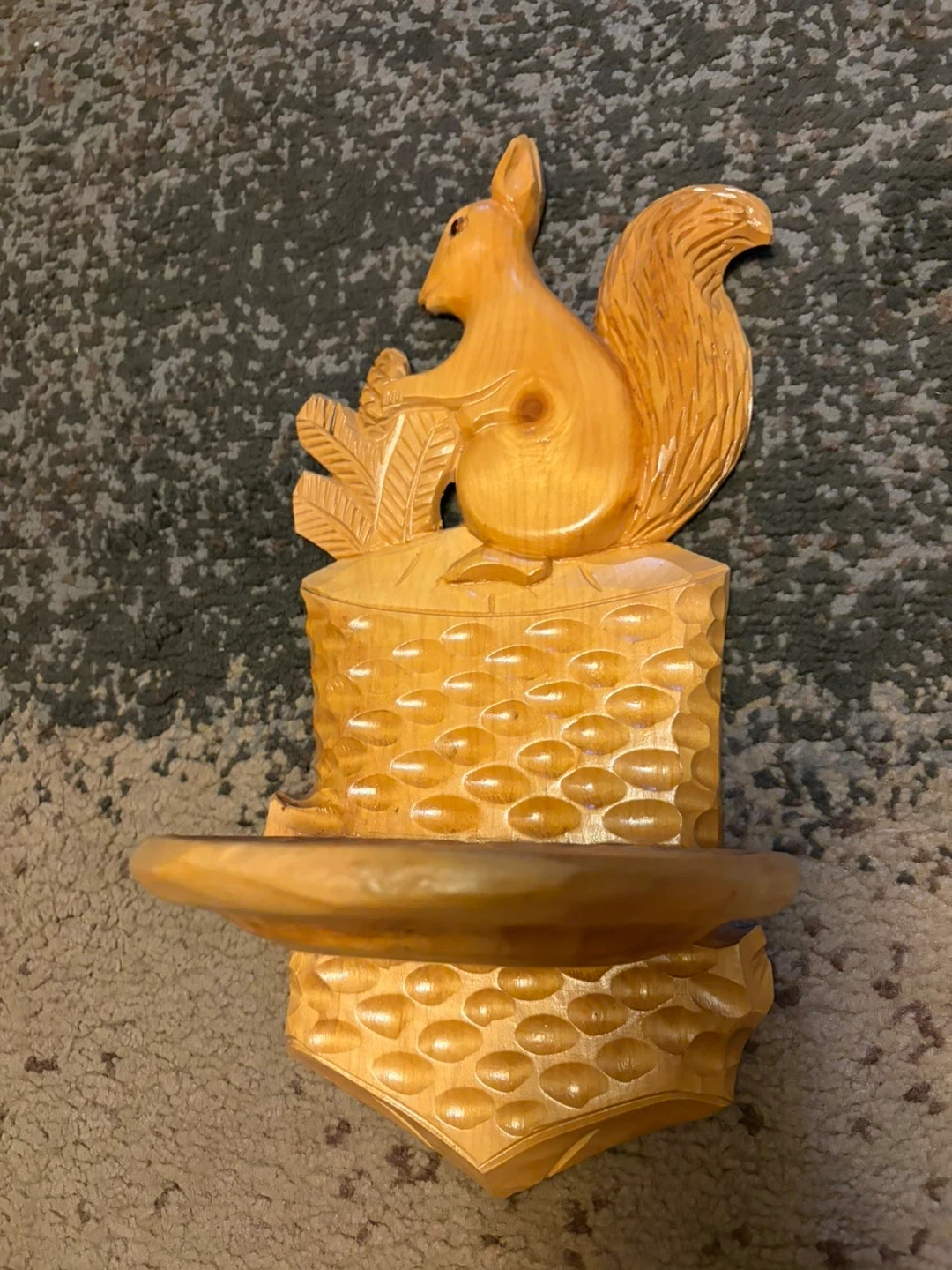 Carved wooden squirrel shelf