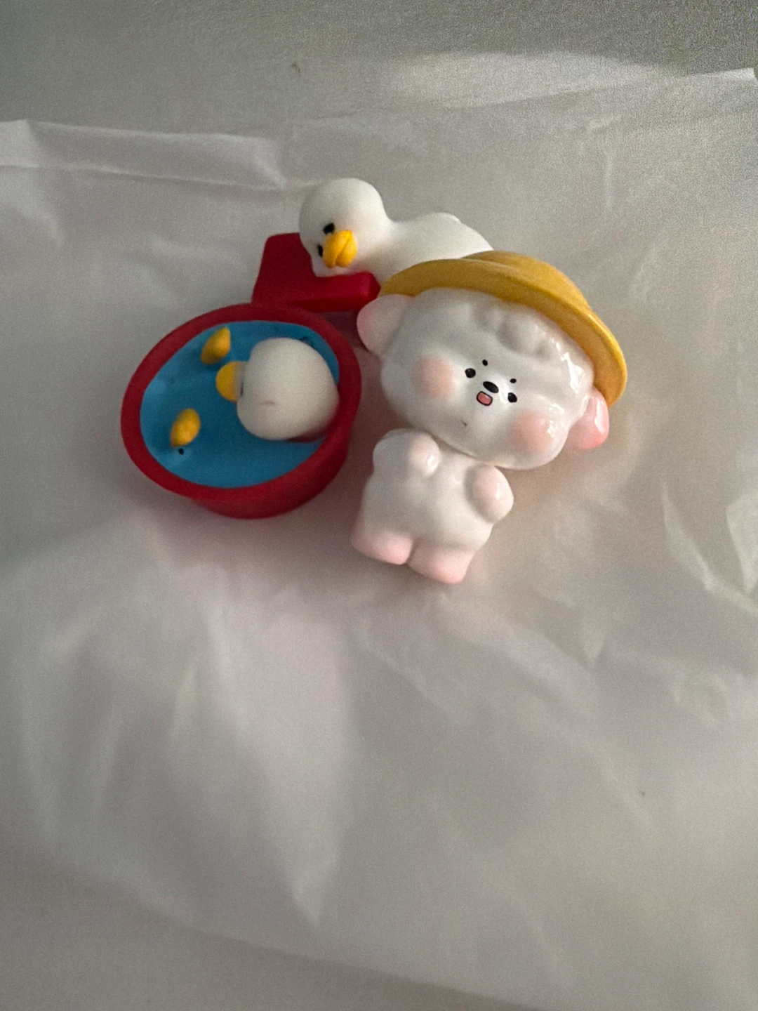 Cute bear and duck figurines