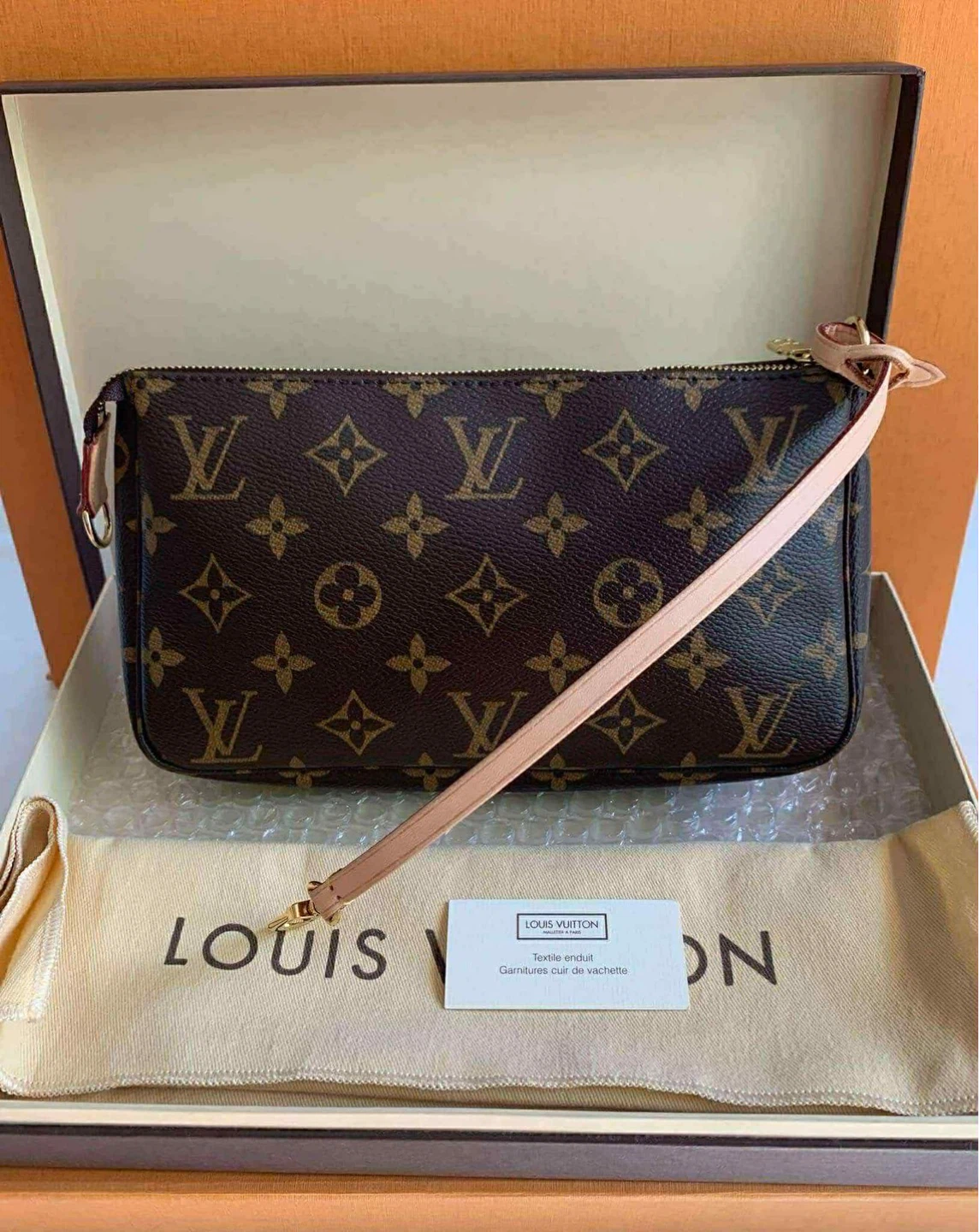 Authentic Louis Vuitton Monogram Pochette check more photos