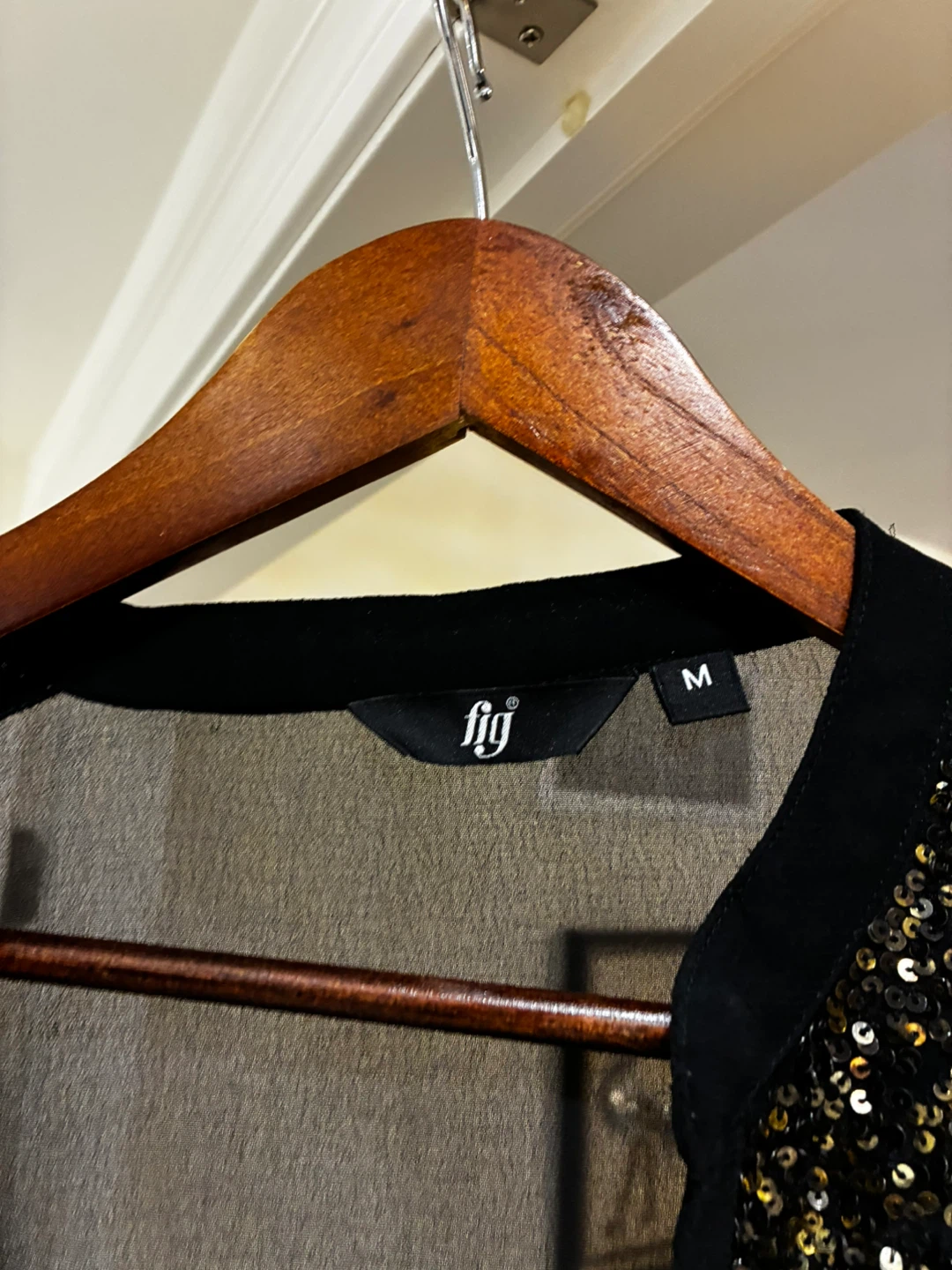 Black sheer blouse with gold embellishments
