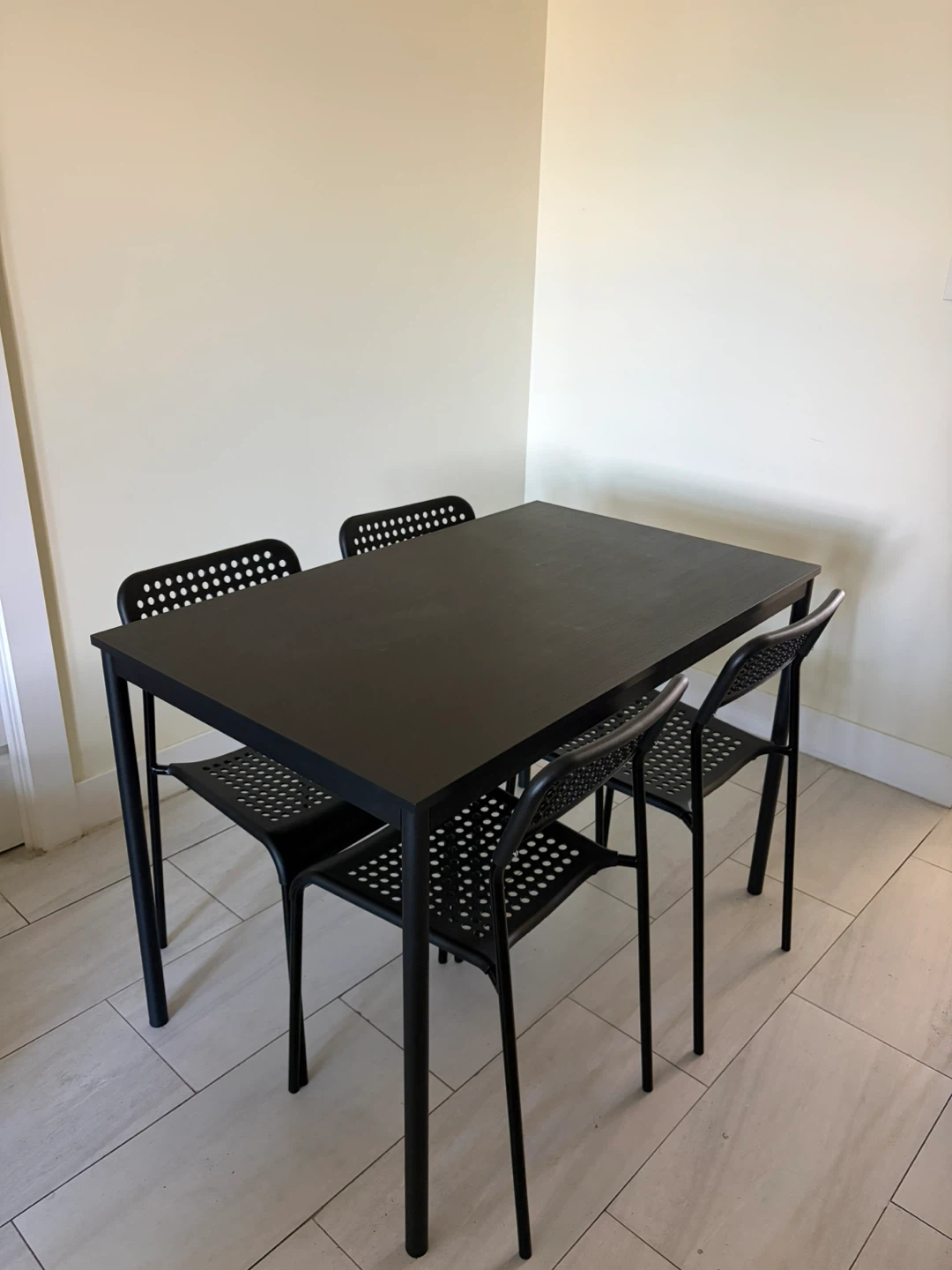 IKEA black dining table with 4 chairs - photo 2