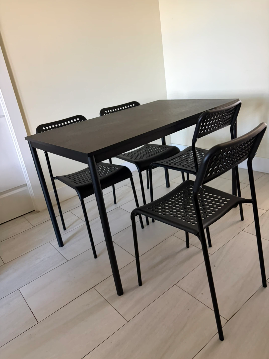 IKEA black dining table with 4 chairs - photo 3