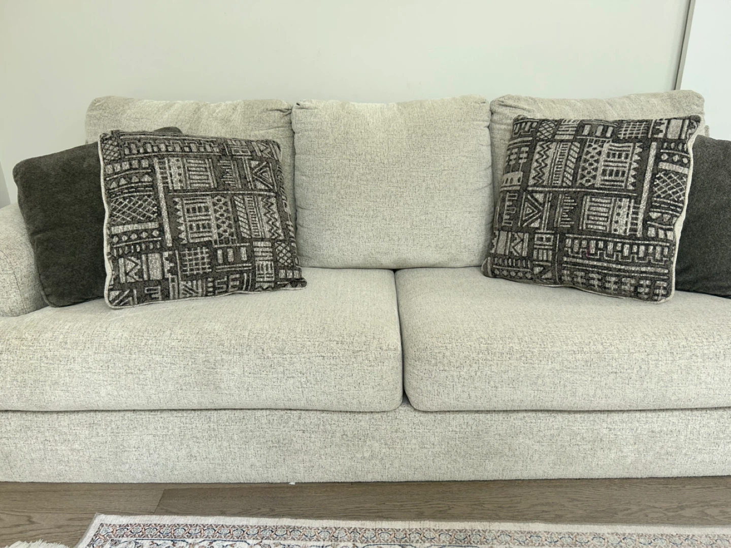 Light Beige Sofa with Decorative Pillows