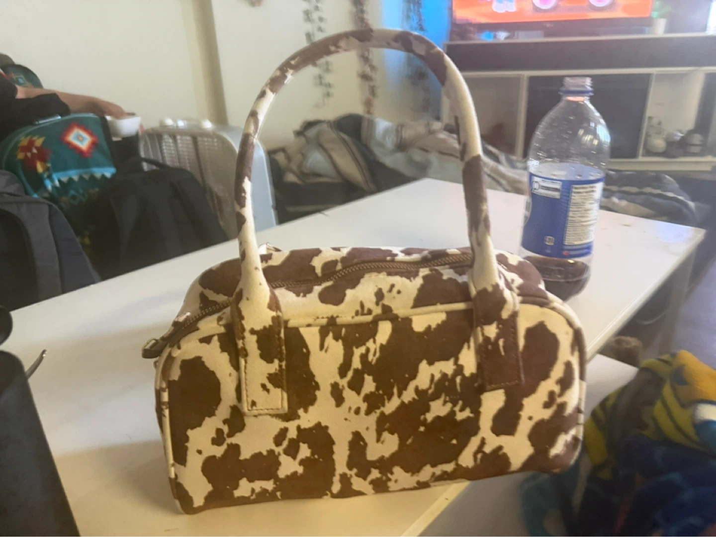 Cow print mini handbag
