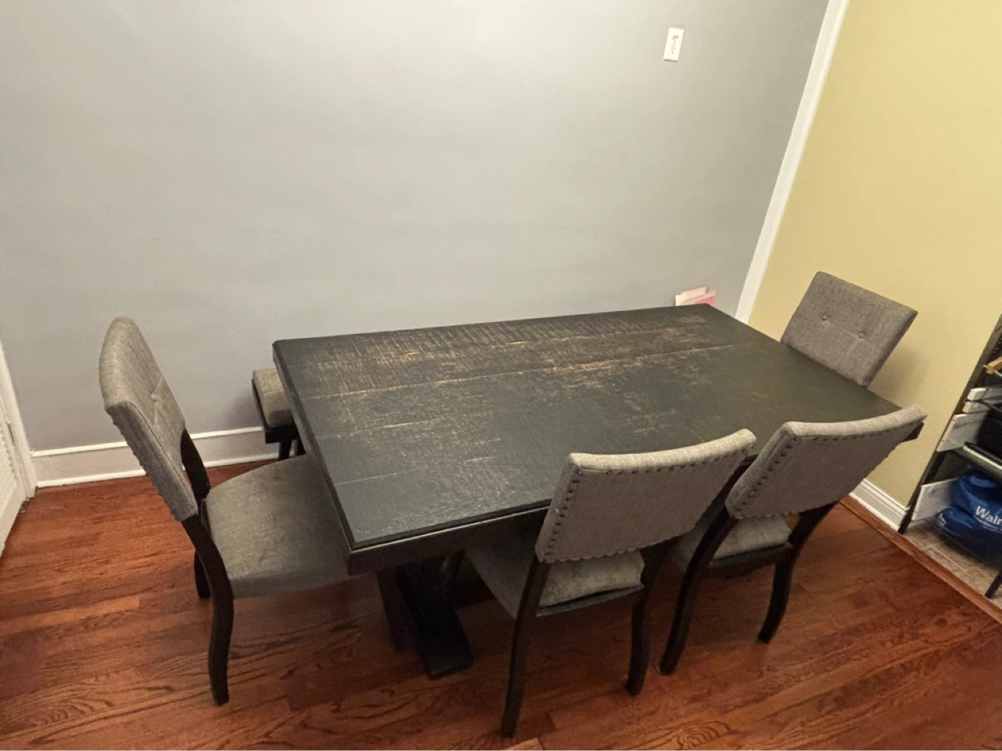 Rustic Dark Wood Dining Table with Upholstered Chairs