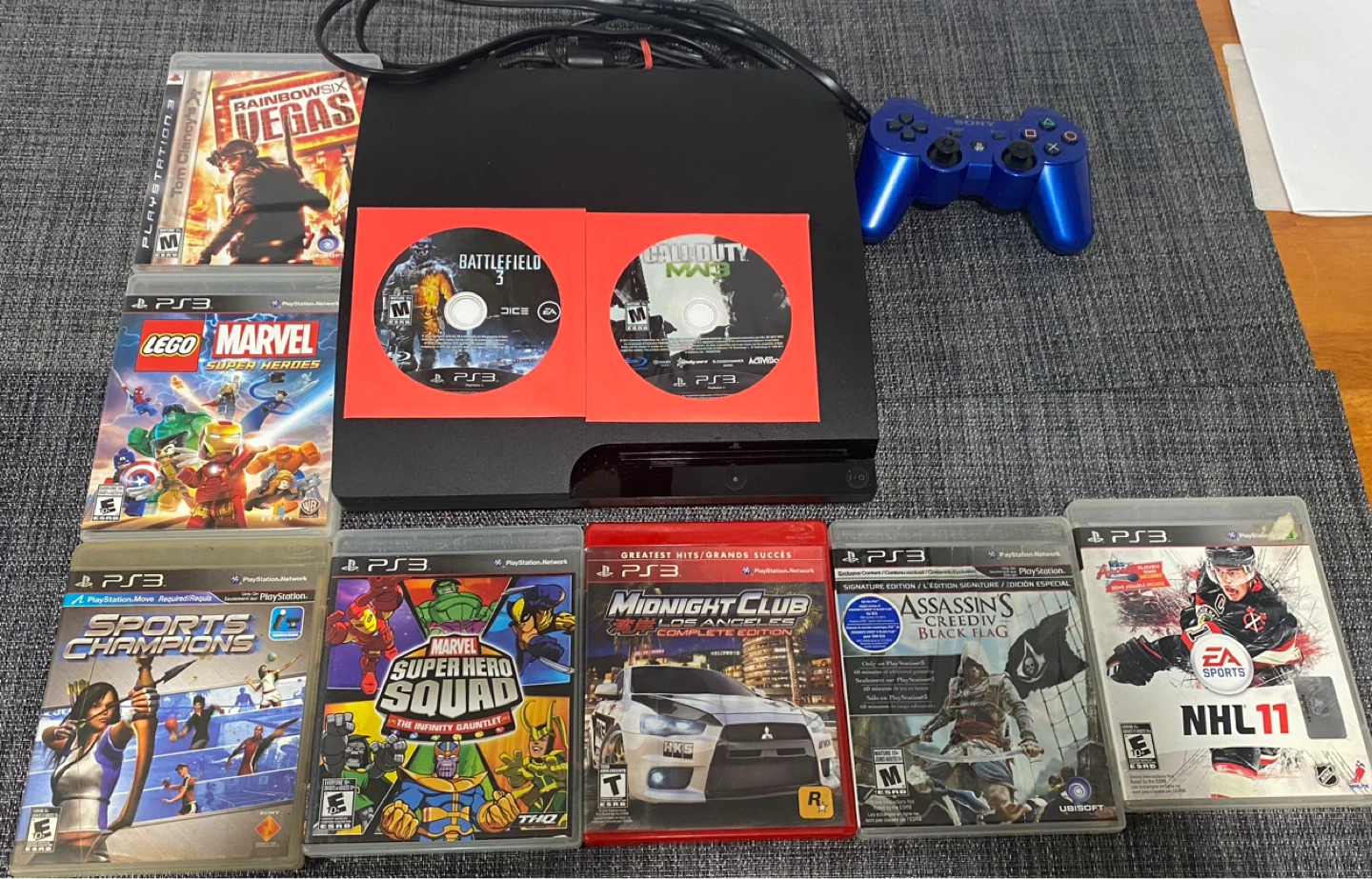 PlayStation 3 Console with 9 Games and Controller - photo 2