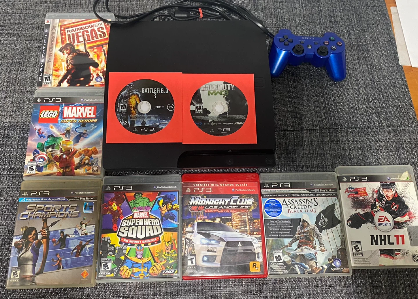 PlayStation 3 Console with 9 Games and Controller
