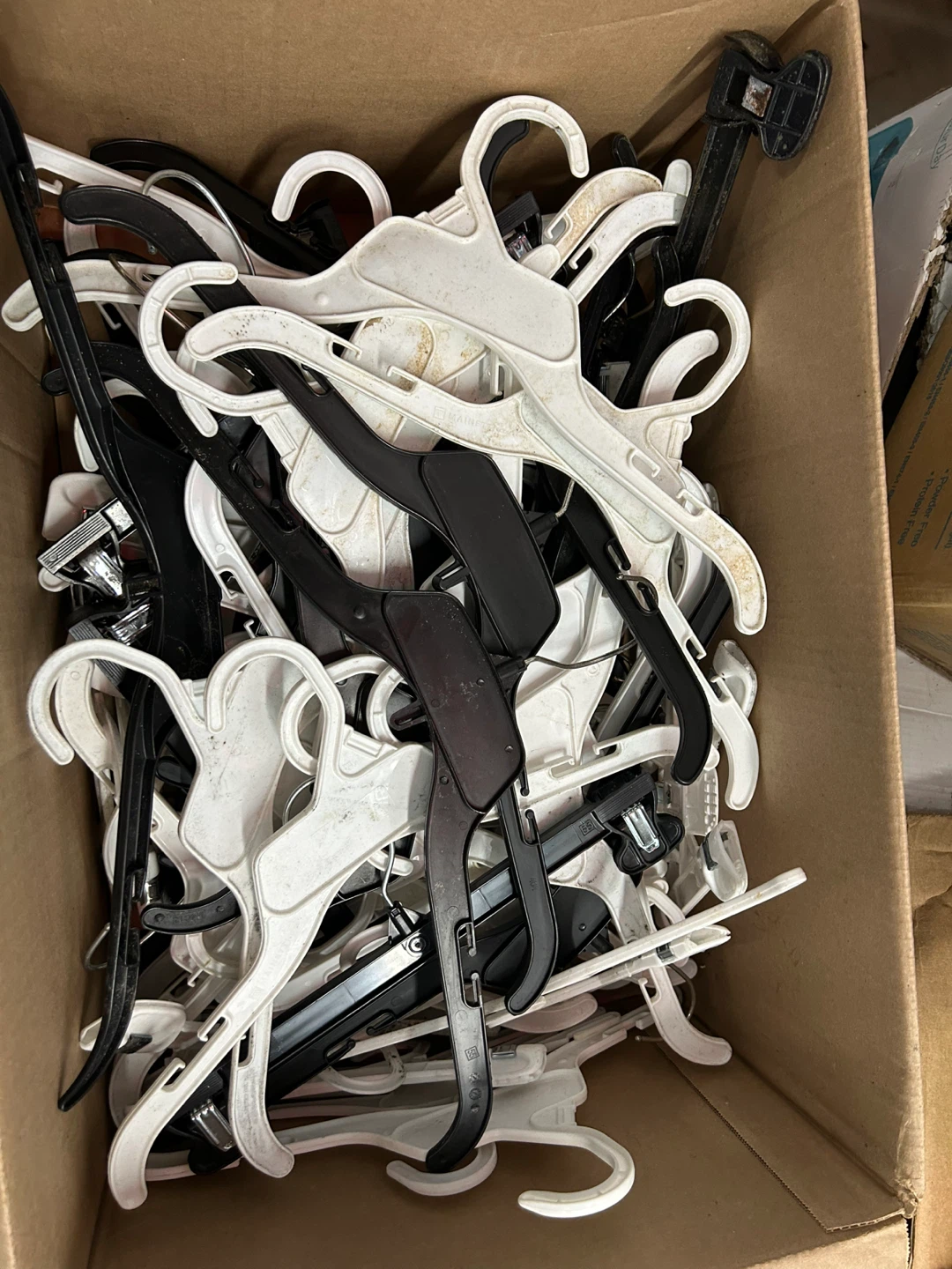 Lot of Black and White Clothes Hangers - photo 2