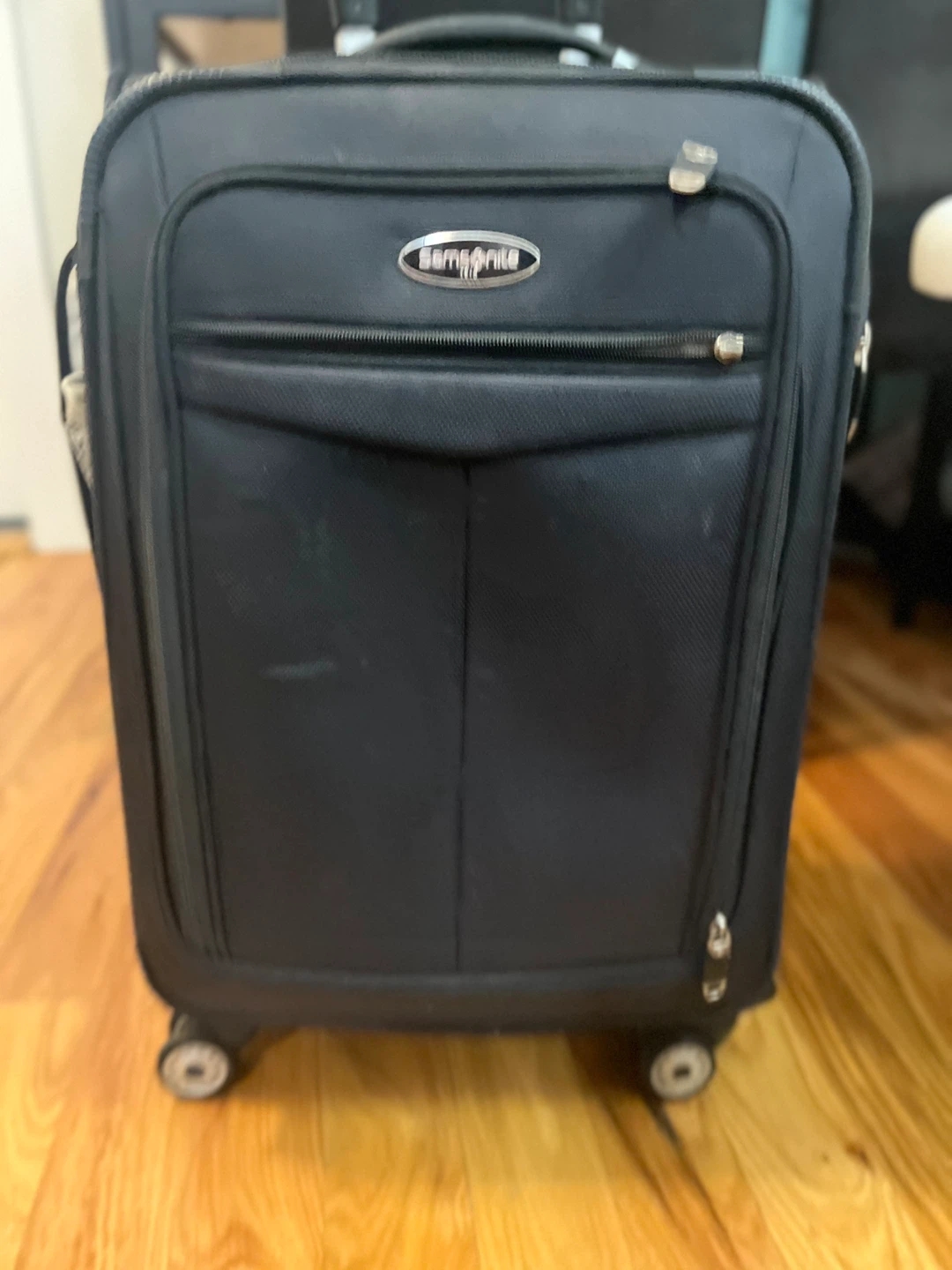Samsonite Black Rolling Suitcase
