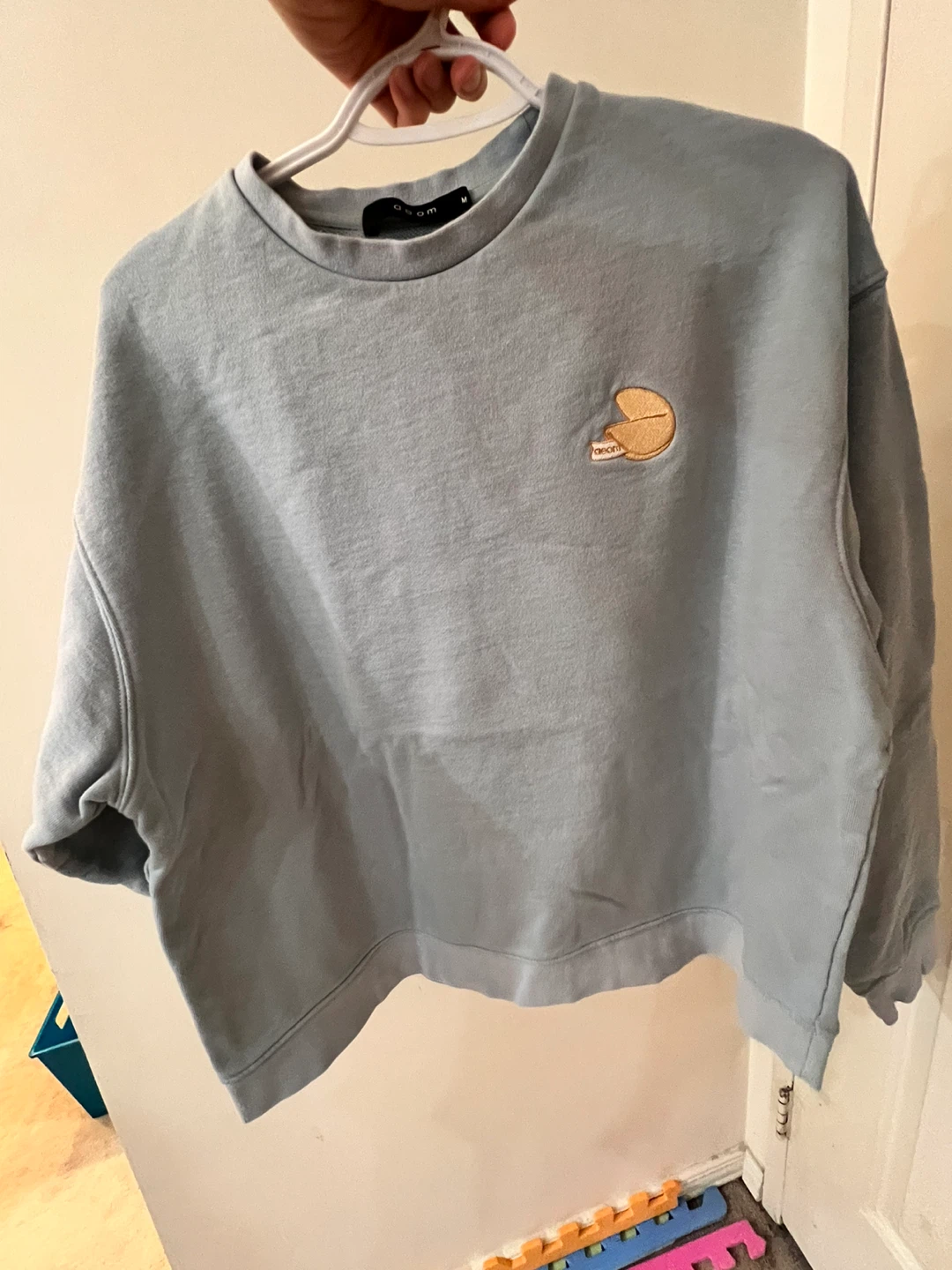 Blue Crewneck Sweatshirt with "All Wealth On Me" Graphic