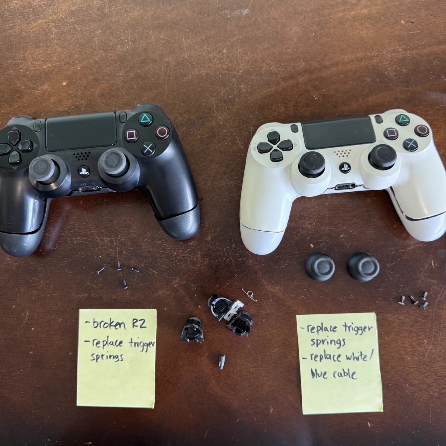 2 Broken PlayStation 4 Controllers for Parts or Repair
