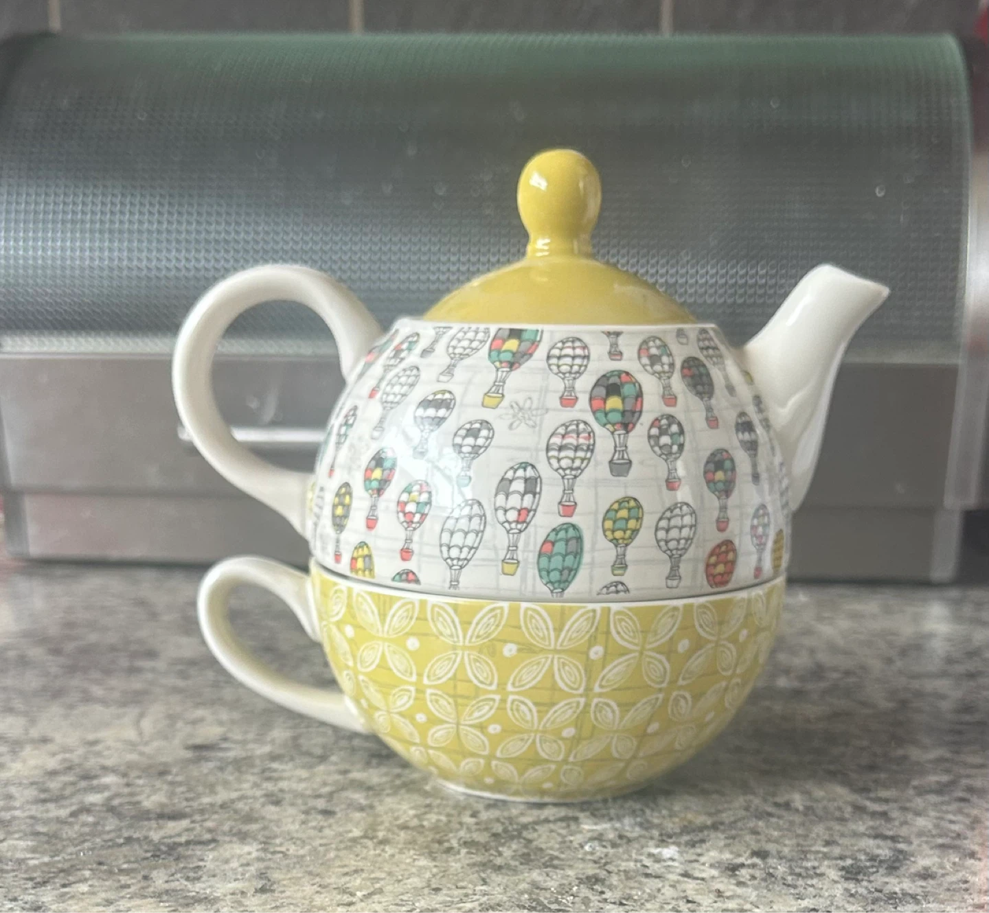 Yellow Tea Cup and Teapot Set with Hot Air Balloon Design