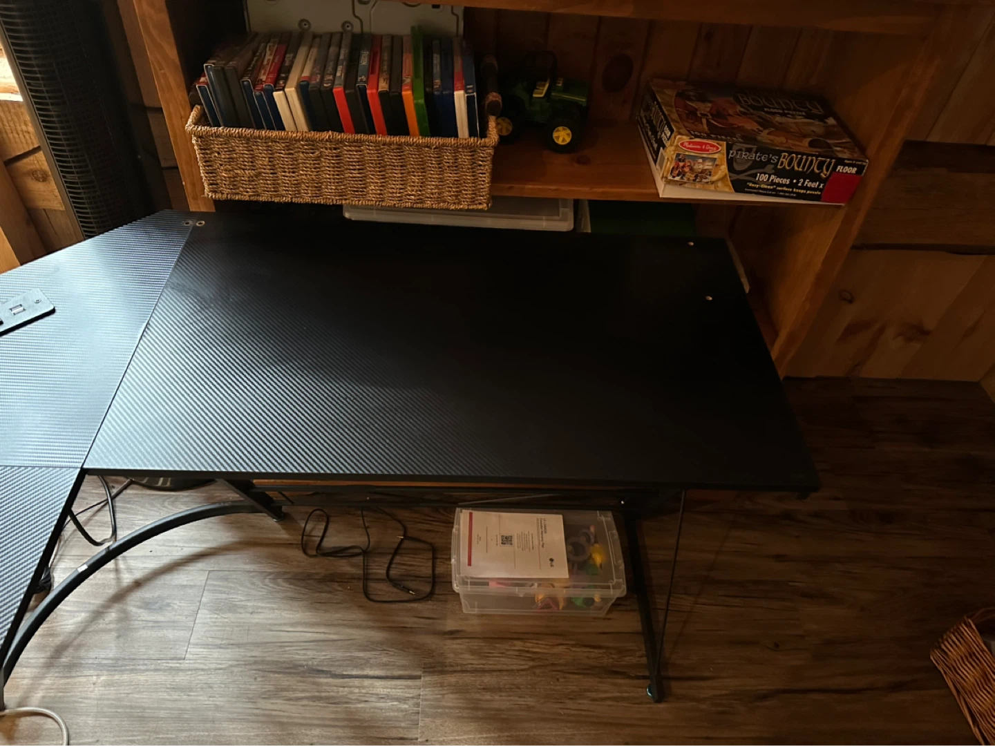 Black L-Shaped Gaming Desk with Carbon Fiber Finish
