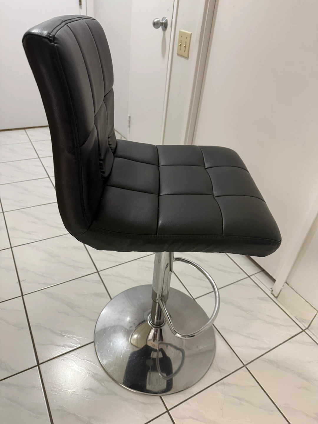 Black adjustable bar stool
