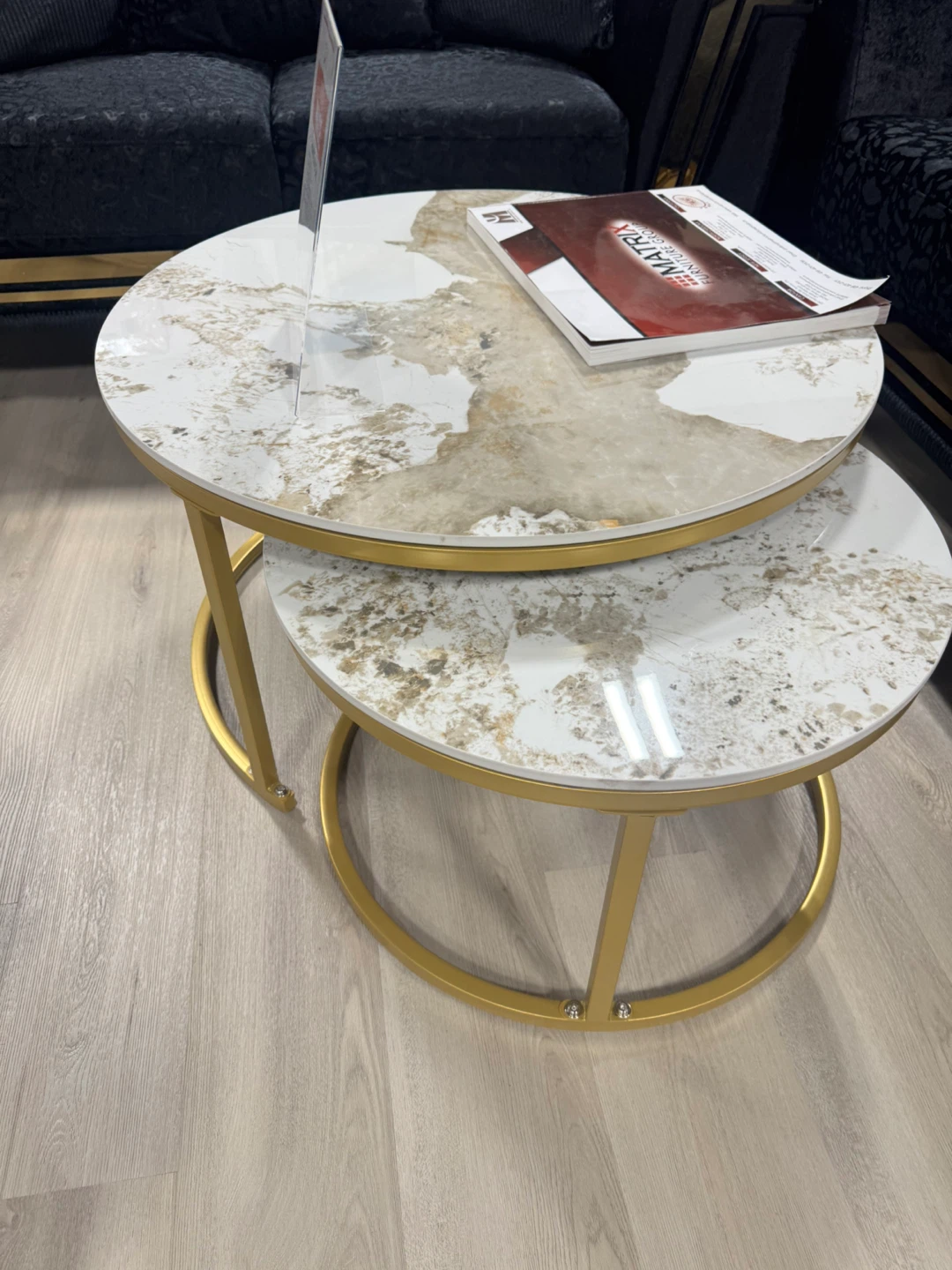Set of 2 nesting marble-look coffee tables with gold frame