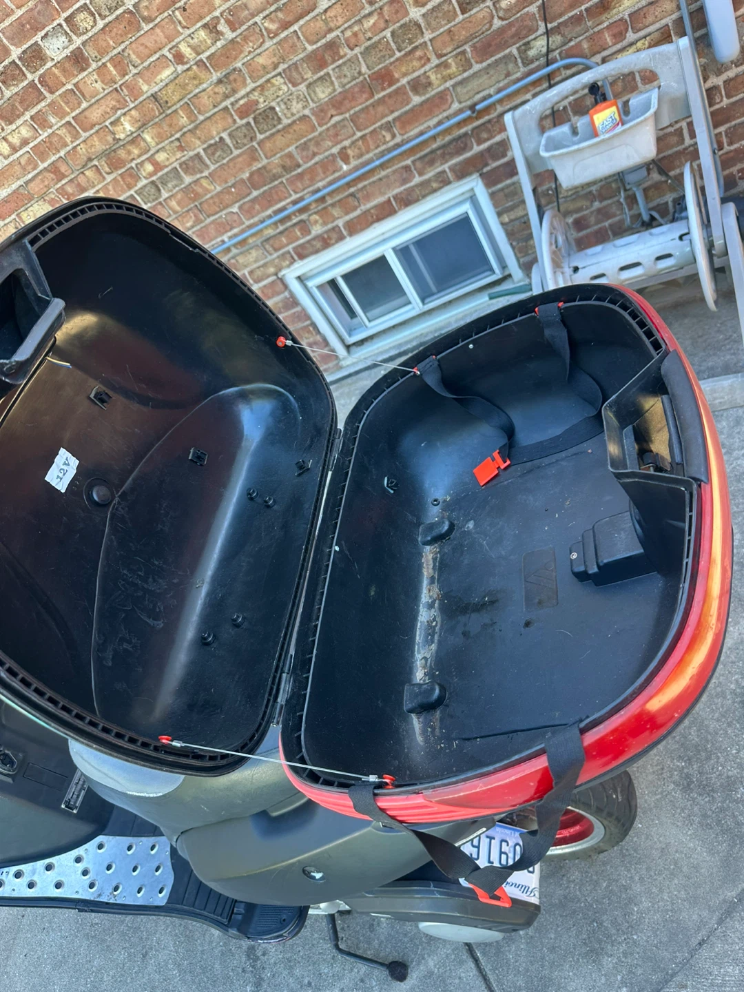 Black Scooter with Storage Trunk