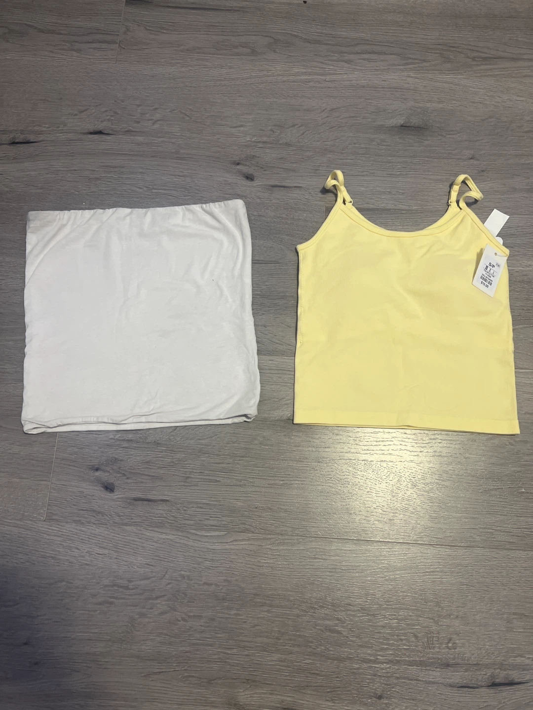 White tube top and yellow tank top