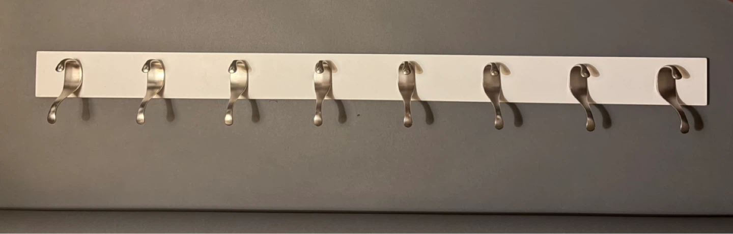 Umbra 8 Hook Wall Cost Rack. Originally $55