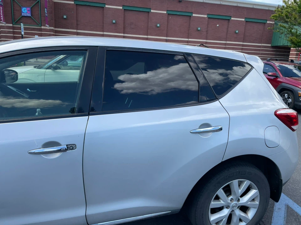 Silver Nissan SUV - photo 3