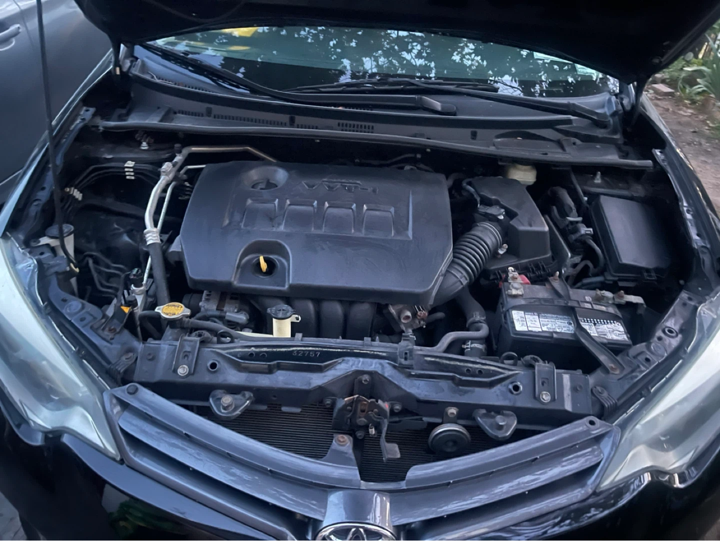 Black Toyota Corolla LE Sedan