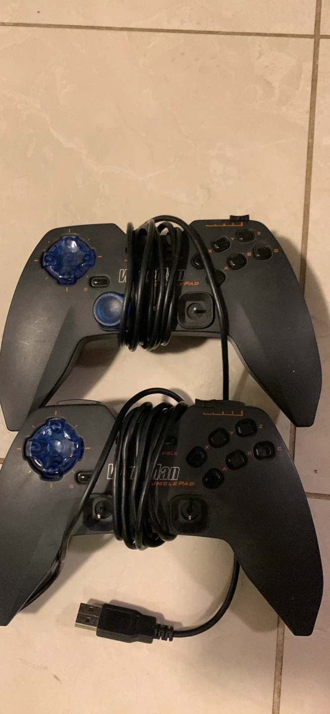 2x Logitech Rumblepad 2 USB Controllers