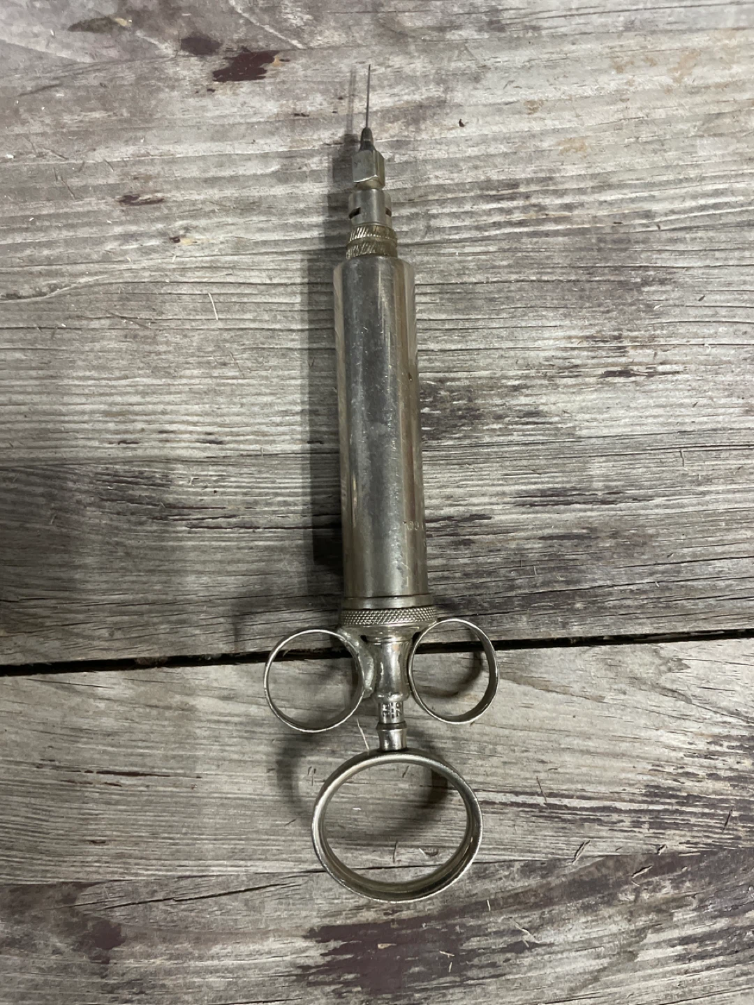 Vintage Metal Syringe with Needle
