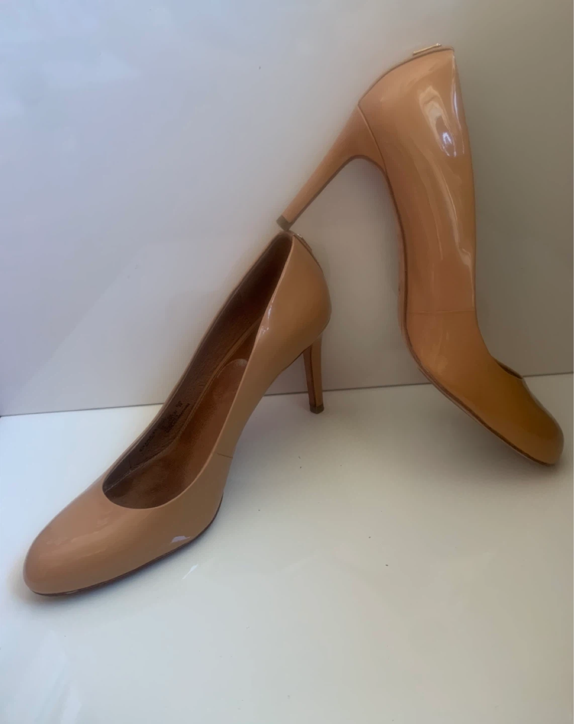 Coach Nude Patent Leather Pumps