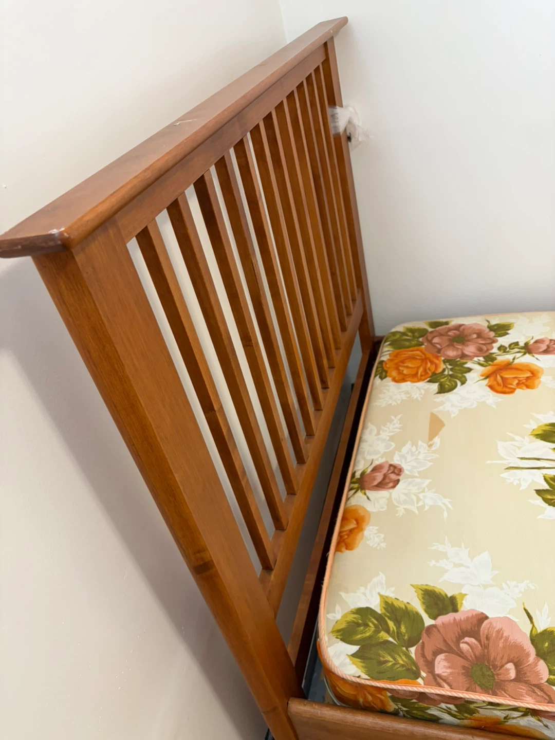 Wooden Bed Frame with Floral Mattress