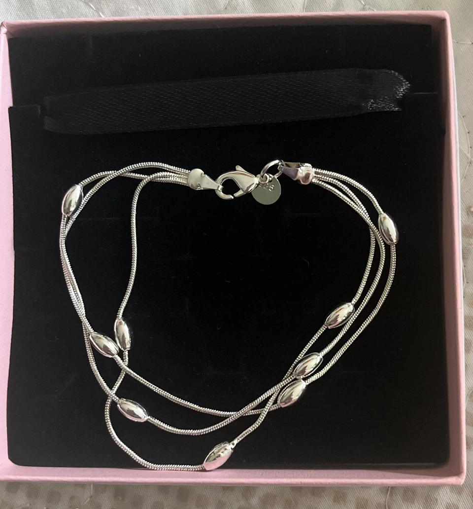 Silver Tone Triple Strand Beaded Bracelet