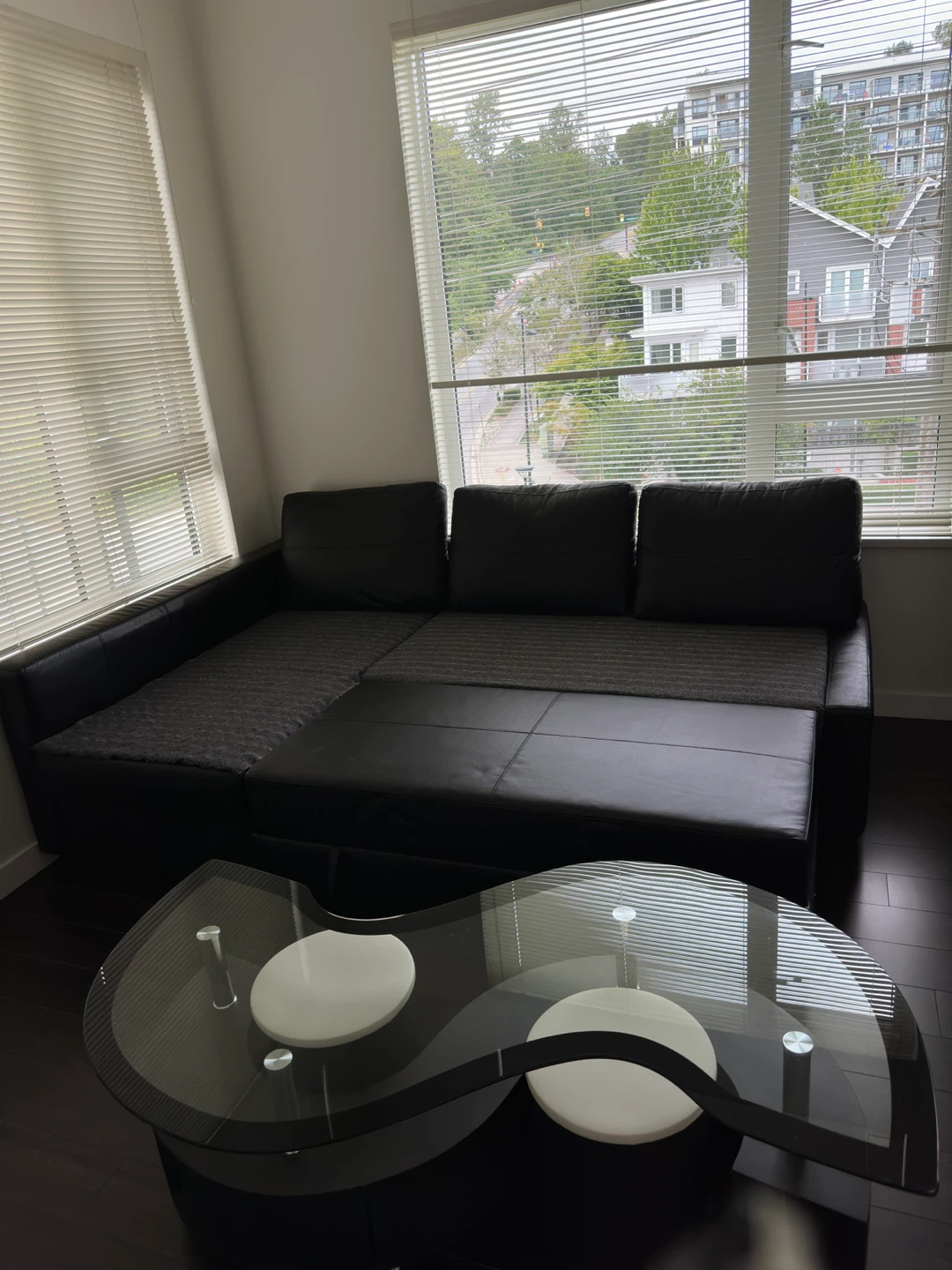 Black sectional couch bed and coffee table - photo 2