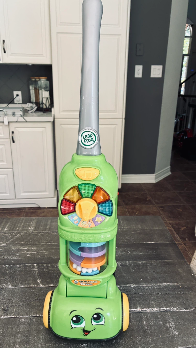 Leap frog toy vacuum cleaner with lights & sounds
