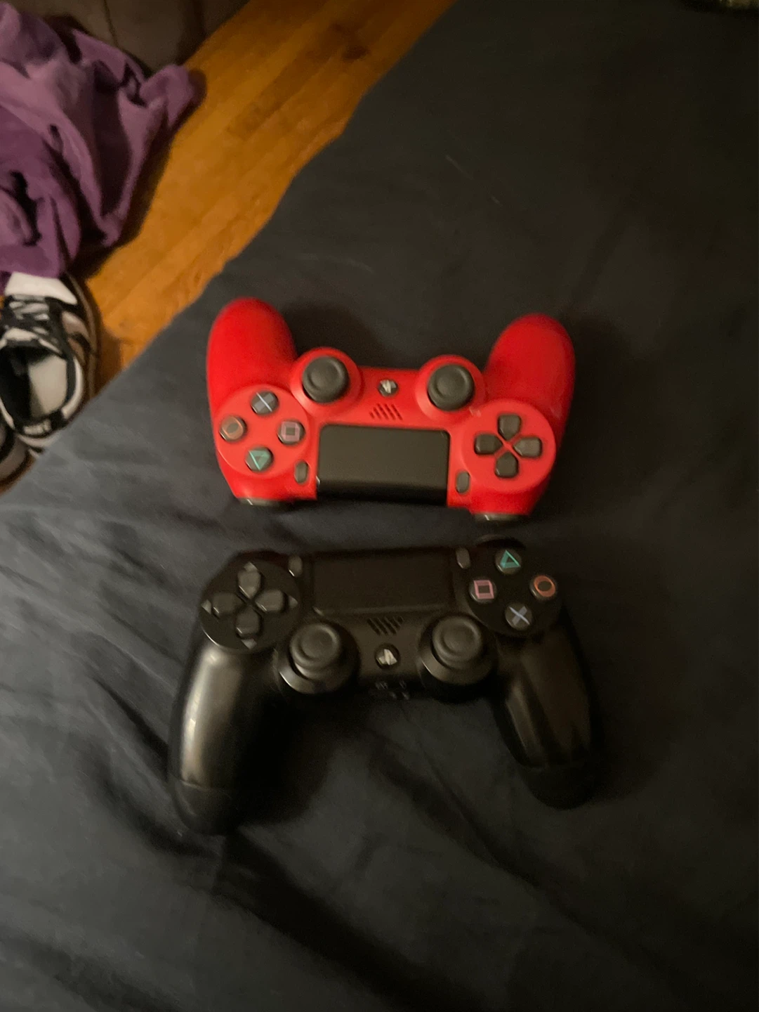 2x PlayStation 4 Controllers (Black & Red)