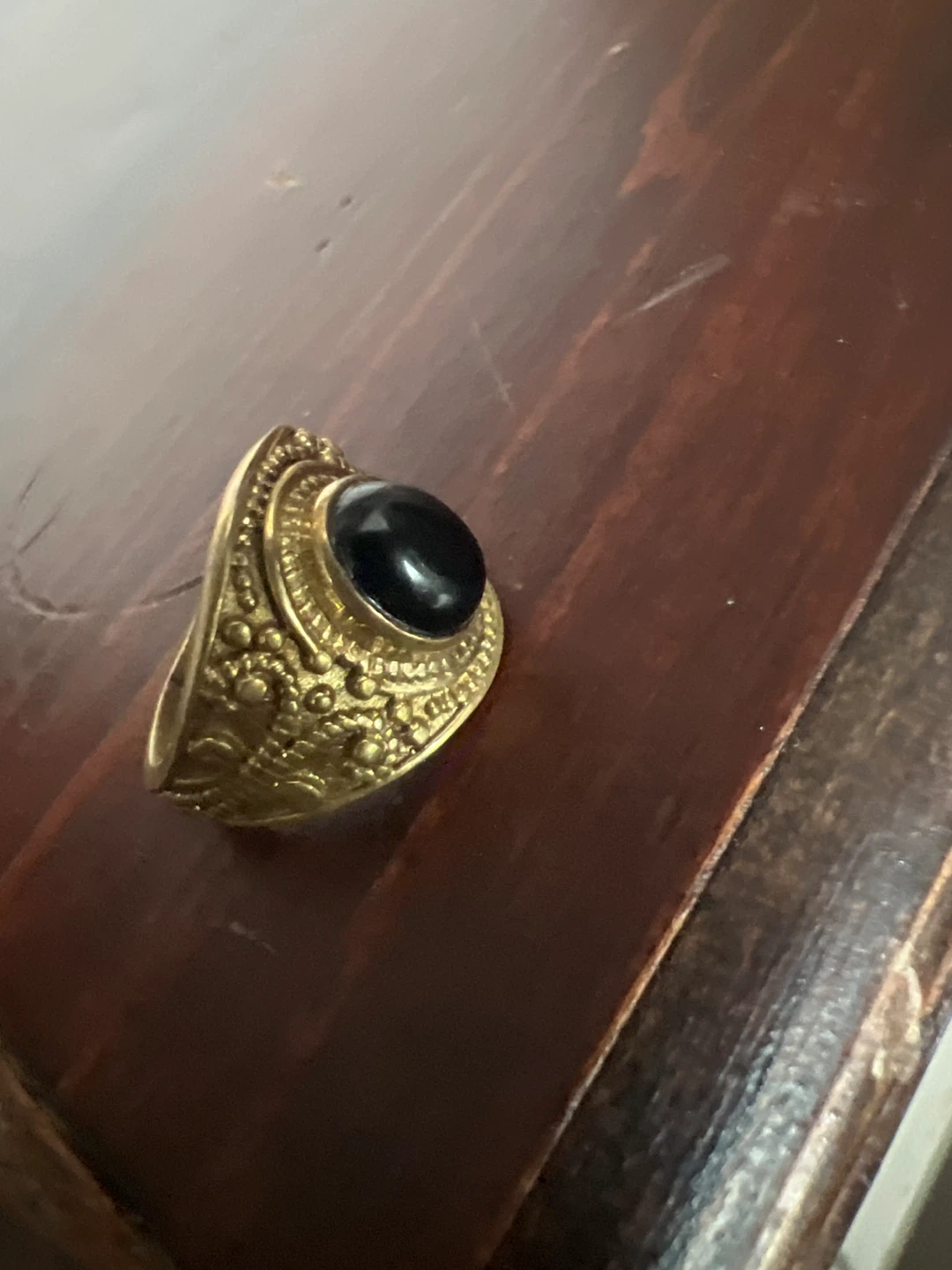 Gold tone ring with black stone - photo 2