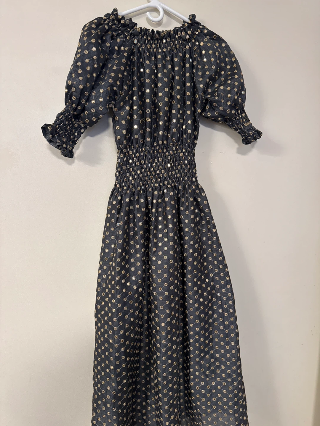 Black polka dot off-the-shoulder dress