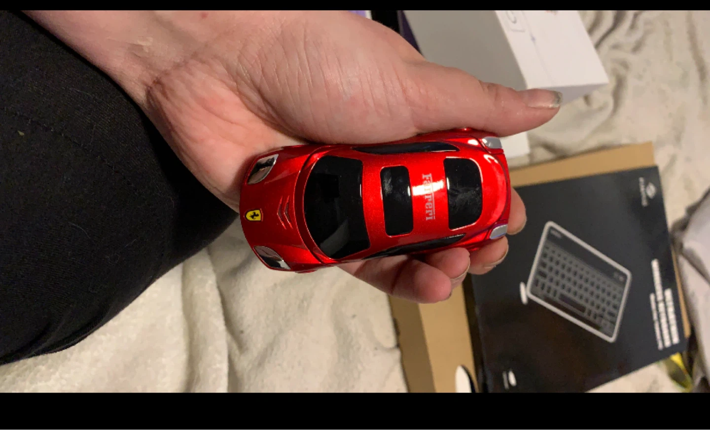 Red Ferrari flip phone