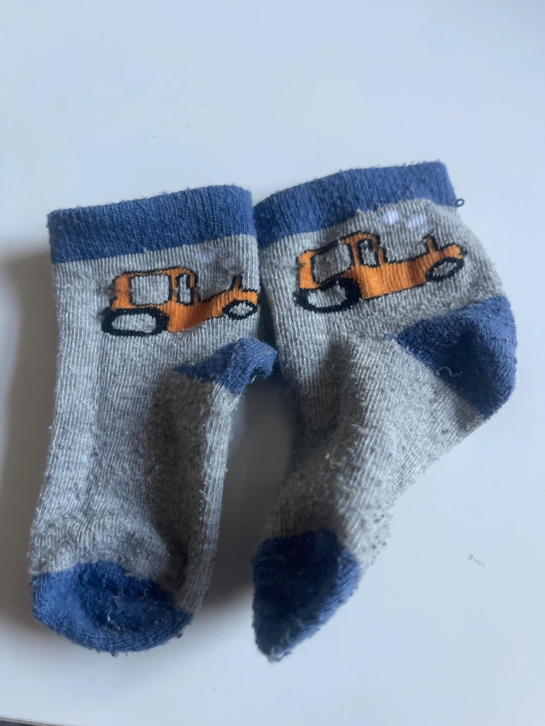 Gray and blue tractor babie socks ⚽