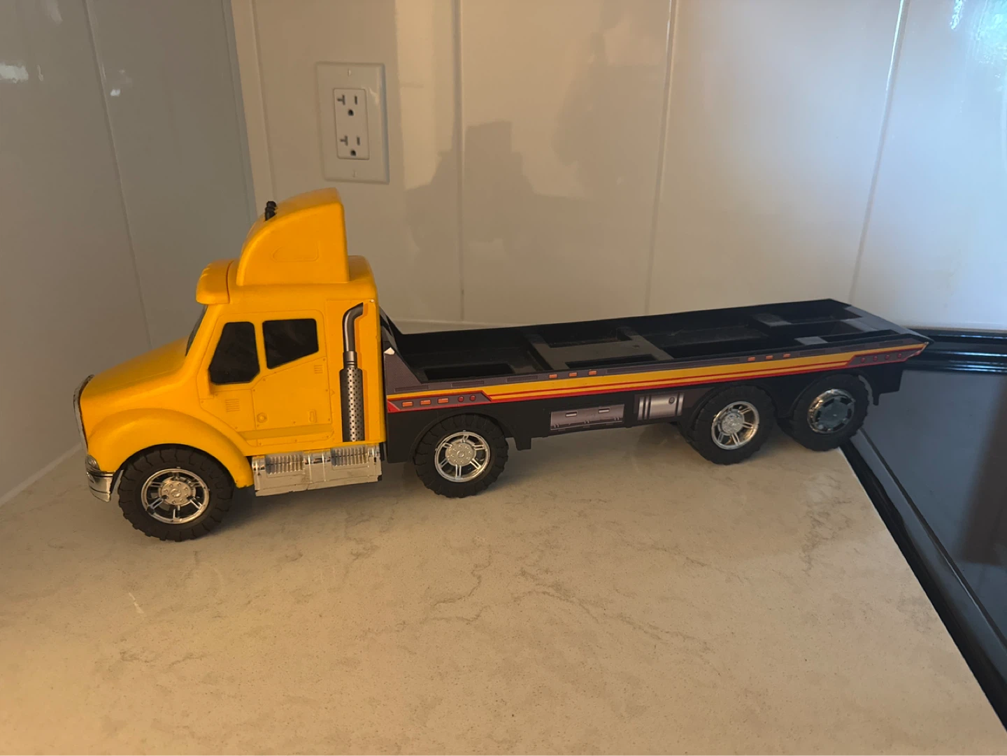 Yellow Flatbed Toy Truck