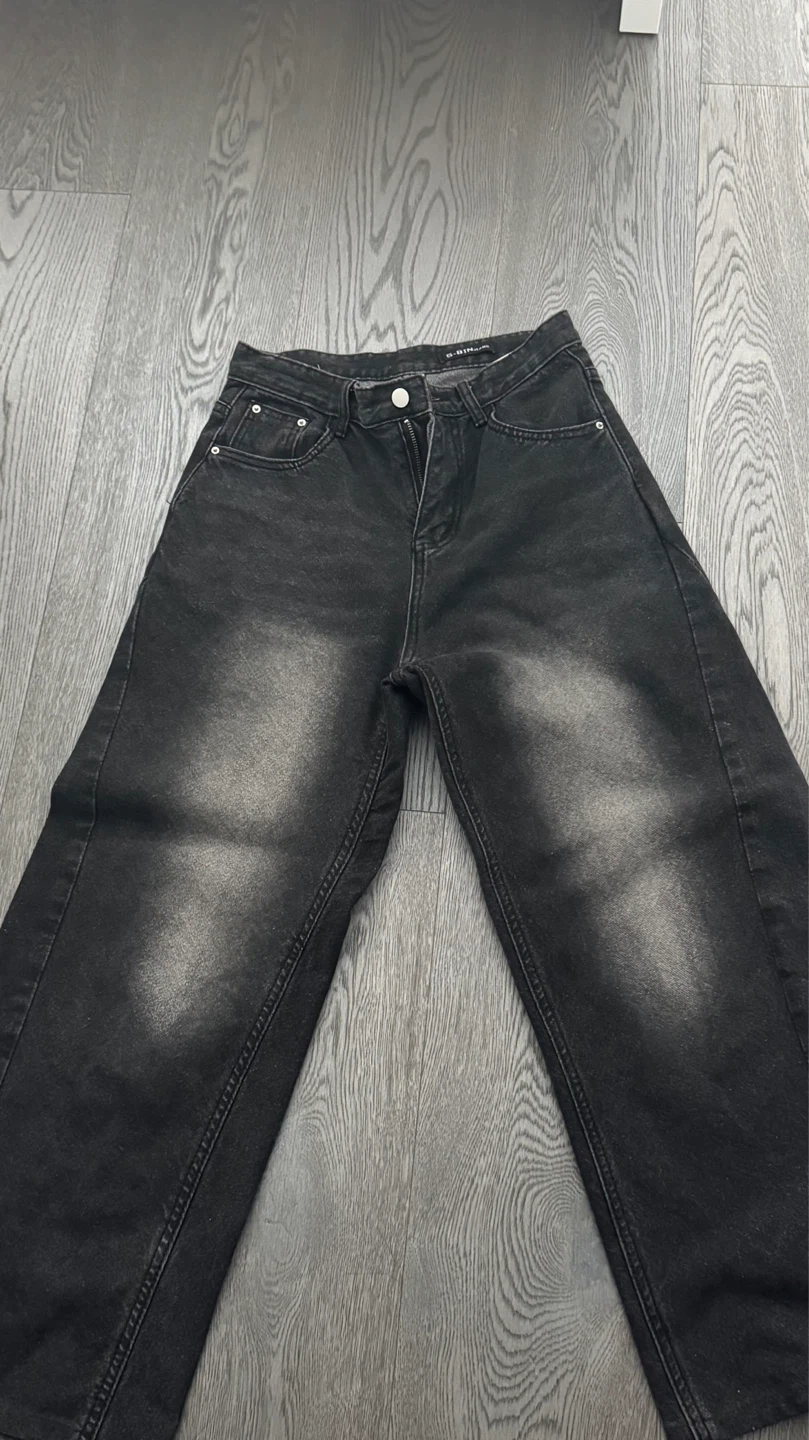 Petite black washed baggy jeans