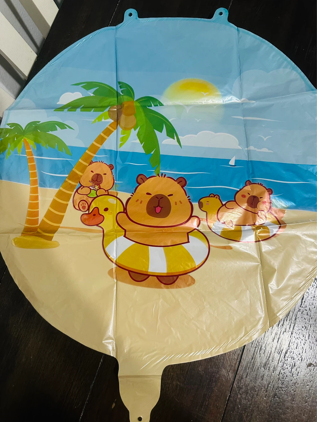 capybara backdrop and foil balloons - photo 3
