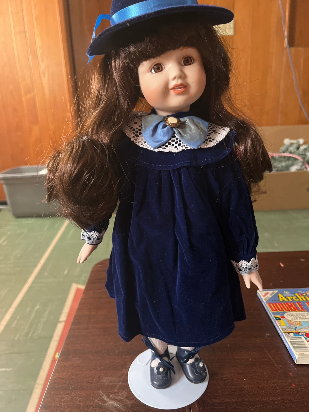 Porcelain Doll in Blue Velvet Dress