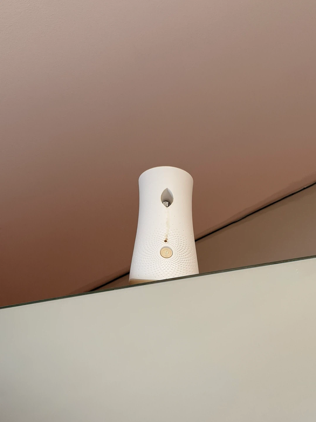 White Air Wick Automatic Air Freshener Spray