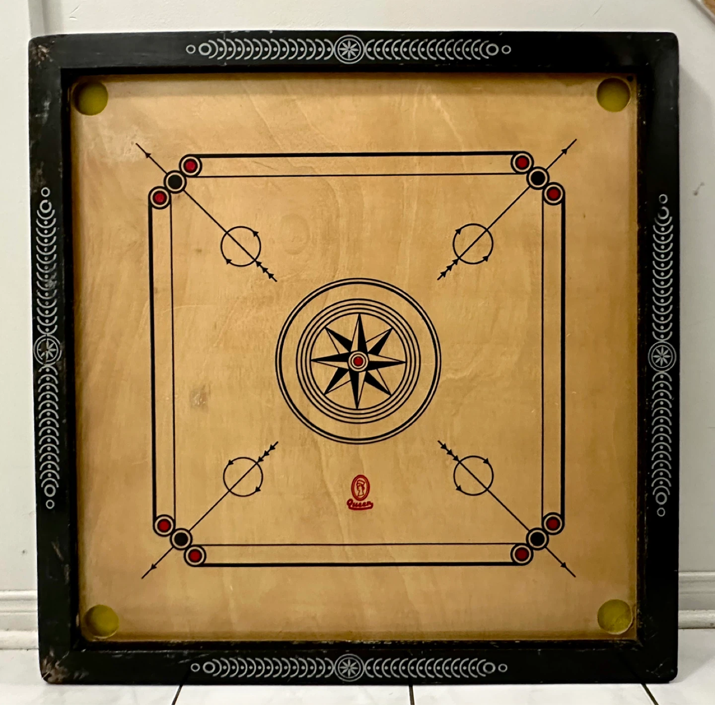 Carrom Board with Coins and Powder