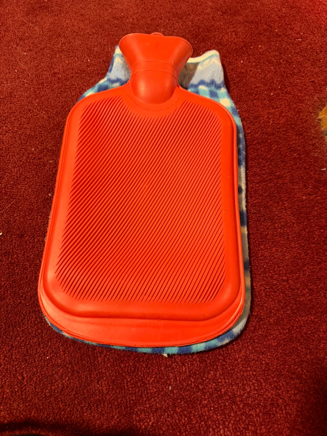 Red Rubber Hot Water Bottle with Fleece Cover