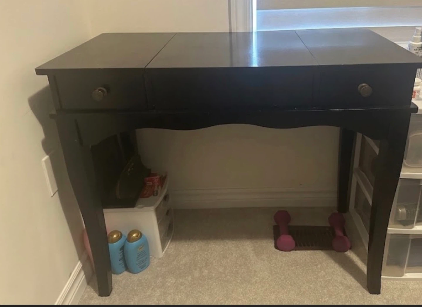Negotiations on Black Vanity Desk
