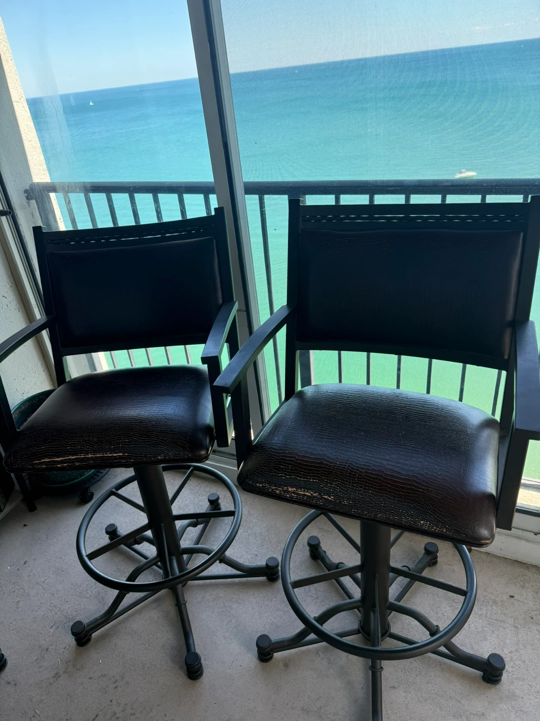 Swivel brown, faux, leather barstools