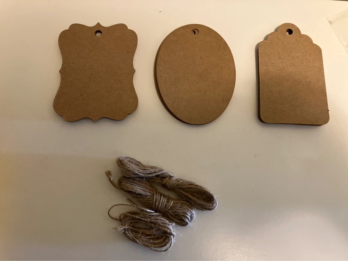 Kraft Paper Gift Tags-each set has 11 in pack-price of each