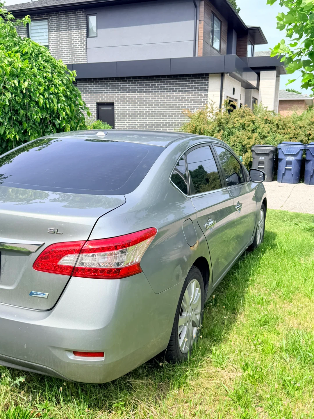Silver Nissan Sentra SL Sedan - photo 4