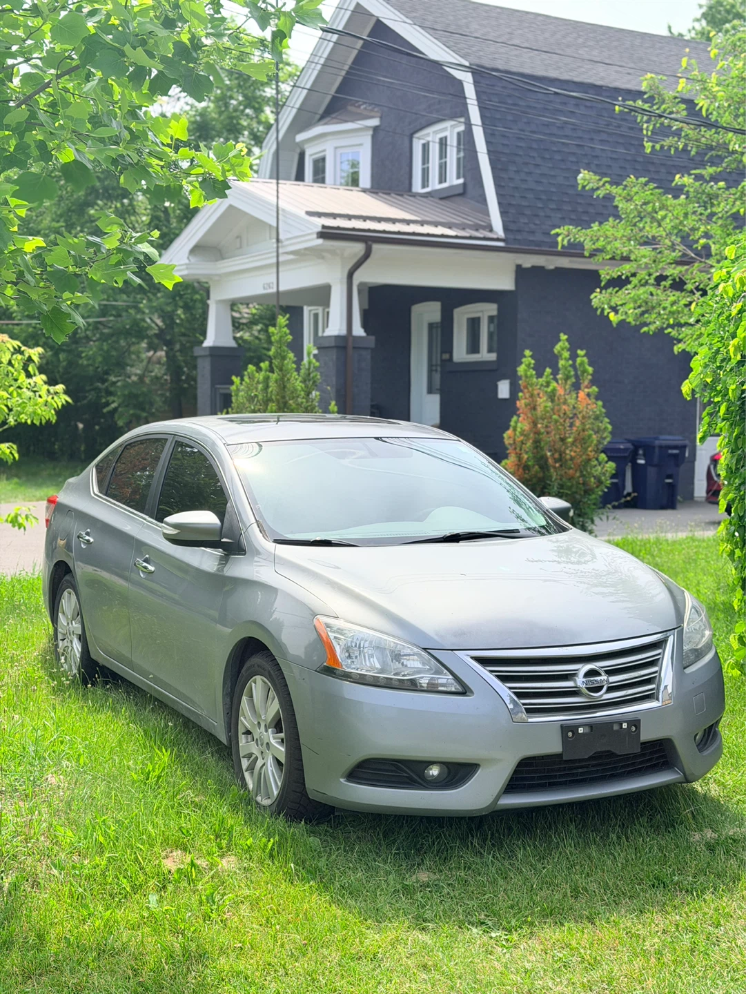 Silver Nissan Sentra SL Sedan